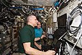 Astronauts Donald Pettit (foreground) and André Kuipers practice grappling Dragon in a simulation aboard the ISS on 11 April 2012.