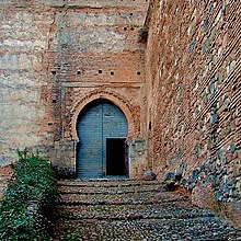 A gate which is part of a larger building