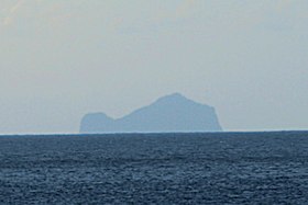 Motu Iti vu depuis les abords de Nuku Hiva.