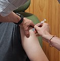 Administration d'un vaccin Moderna au Québec