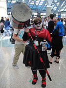 Anime Expo 2011 - Harley Quinn and a giant hammer (5917374869).jpg