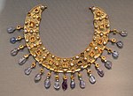 Collier; late 6th–7th century; gold, an emerald, a sapphire, amethysts and pearls; diameter: 23 cm (9.1 in); from a Constantinopolitan workshop; Antikensammlung Berlin (Berlin, Germany)[286]