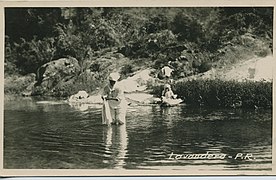 Women washing clothes in a river, Puerto Rico.jpg