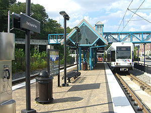 Light rail platform, which contains a pedestrian bridge to the ferry terminal