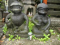 A paired male and female kappa statues at the Sogenji Buddhist shrine at the Asakusa district in Tokyo.