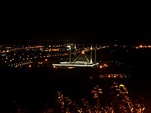 A night view of King Faisal Mosque and the surrounding neighbourhood in Islamabad, Pakistan.