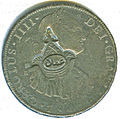 Anverso de moneda de 8 reales (plata) de Carlos IV con resello de Omán.