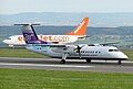 An easyJet Boeing 737 and an Air Southwest DHC-8 Dash 8 at Bristol Airport