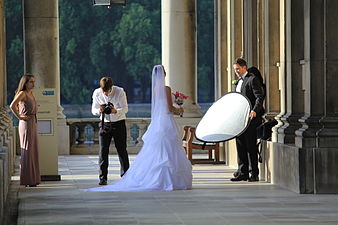 Bride having photos taken inside Royal Naval College Queen Mary's Quarter