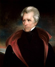 White-haired man with black coat