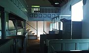 Interior of the eighteenth-century Pen Rhiw Unitarian Chapel, originally from Dre-fach Felindre, now at St Fagans National History Museum