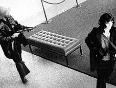 Patty Hearst takes part in the April 1974 Hiberna bank raid with other SLA members.jpg