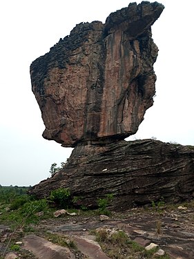 Naturally formed amazing cliff. Looks like the one on top was intentionally placed there. It appears it's falling down but has been there for ages Photograph: User:Yawpk