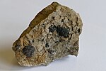 Thumbnail for File:Axinite, stilbite and chlorite 01.jpg