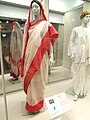 Image 1Red and cream Indian woman's saree, late 1990s (from 1990s in fashion)