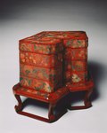 Japanese tiered food Box with stand; late 18th century; red lacquer over a wood core, with litharge painting and engraved gold designs; overall: 53 x 68 cm; Cleveland Museum of Art