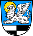 Gemeinde Oberickelsheim Über einem von Silber und Schwarz gevierten Schildfuß, in Blau ein liegender, geflügelter, golden nimbierter silberner Löwe (Markuslöwe).