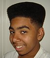 Image 48African-American teenager with Hitop fade, popular in the early 1990s. (from 1990s in fashion)