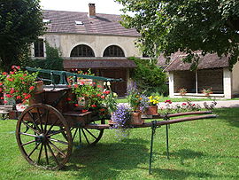 The village square, with the washhouse in the background