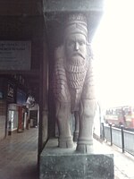 The entrance of a fire temple in Fort Mumbai displaying a lamassu