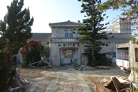 The historical building "Kosei Asahi Shell Button Factory" was built in 1940. It made buttons from local conch shells and sold them to Japan. Photographer: 地下高雄