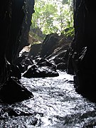 A wet cave in Laos - panoramio.jpg