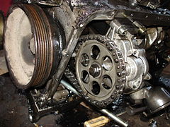 A close view of OM601's oil pump. On the left side the crankshaft belt drive washer is visible.