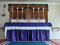 Altar in Rio de Janeiro, Brazil, decorated with purple cloth for Advent