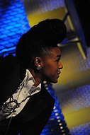 Janelle Monáe appearing on a panel at the 2010 Pop Conference