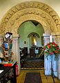 The Romanesque doorway was added in 1859