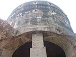 Dome of the Tomb, seen from southern facade, and modern brick-pillar is behind the dome.