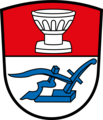 Gemeinde Erlingen Geteilt von Rot und Silber; oben ein silberner Taufstein, unten ein blauer Pflug.
