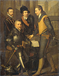 Louis (à gauche) avec ses frères Jean (assis), Adolphe, et Henri.