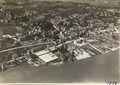 Luftbild von Walter Mittelholzer (1919). Links vorne die Seidenfabrik, heute die Rote Fabrik. In der Bildmitte führt die Albisstrasse durch das Morgental hoch.