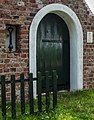 Monument van een restant van een vroegere kerk.