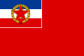 Yugoslav naval ensign from 1949 to 1993, which had a canton consisting of a horizontal triband of blue, white, and red, defaced with a star and wreath.