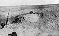 TYPICAL REAR-GUARD TRENCHES IN THE GREAT RUSSIAN RETREAT: A SHELL BURST OVER THIS POSITION JUST AS THE PICTURE WAS TAKEN.