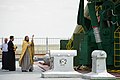 An Orthodox priest blesses the Soyuz rocket on 14 May 2012.