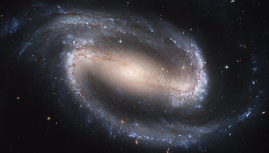 NGC 1300: Irmak takımyıldızı kenarında, yaklaşık 61 milyon ışık yılı uzaklıkta yer alan çubuklu sarmal gökada (Üreten: NASA, ESA)