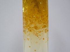 Lead(II) iodide crystals grown in silica gel.JPG