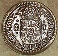 Reverso dunha moeda de 1 marabedí (cobre) de Fernando VI da ceca de Segovia do ano 1747.