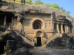 Exterior of cave No.18. Cave No.17 is visible on the right, cave No.20 on the left, and a corner of cave No,19 bottom left.