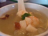 Close-up view of a winter melon and seafood soup