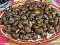 Snails sold in a market to eat.