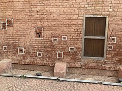 Bullet holes in wall at Jallianwala Bagh memorial.jpg