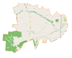 Mapa konturowa gminy Rzeczyca, blisko centrum na prawo znajduje się punkt z opisem „Tłumy”