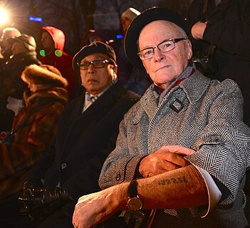 Memorial Ceremony at the Raoul Wallenberg square in Stockholm with Holocaust survivors (one showing number tattoo on the arm). 27 January 2013, International Holocaust Remembrance Day.