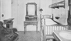 Dormitorio de la cabina estándar B-21 de primera clase a bordo del Olympic, muy similar en el Titanic.