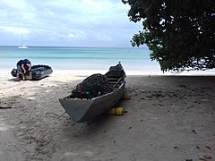 Fishing boat ashore in Beau Vallon, Seychelles.jpg