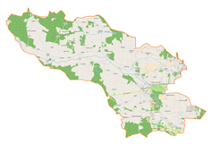 Mapa konturowa gminy Lutomiersk, blisko centrum po prawej na dole znajduje się punkt z opisem „Salezjańskie Szkoły Muzyczne w Lutomiersku”